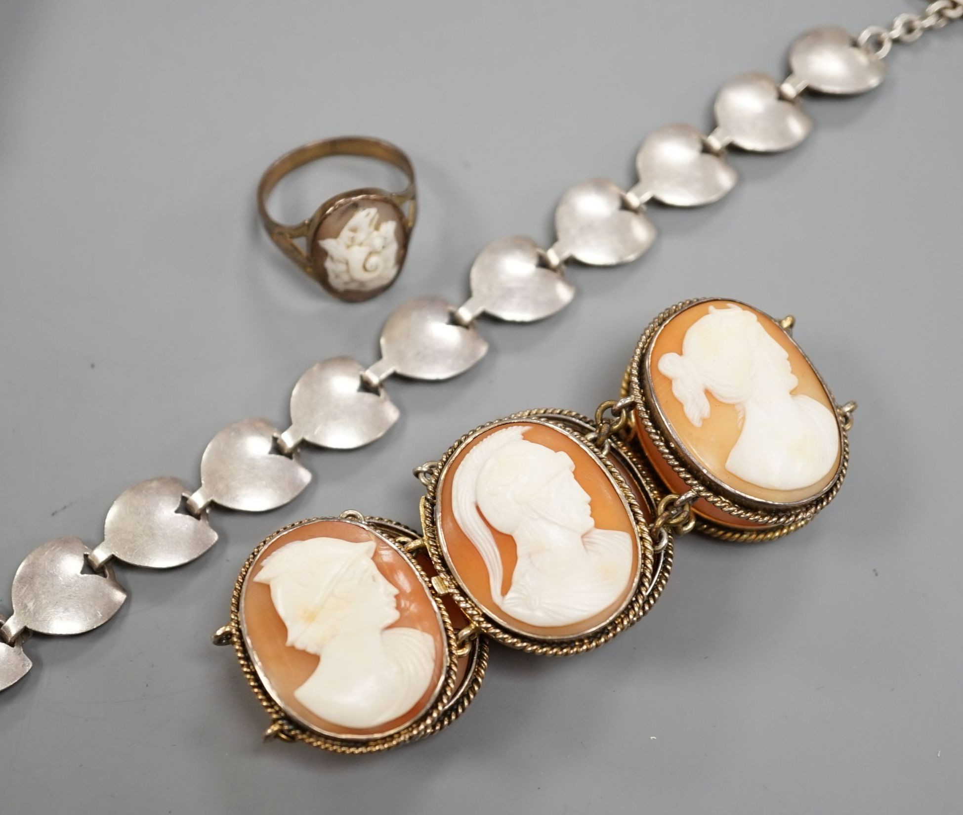 A gilt white metal and cameo shell set bracelet, a similar ring and a sterling 925 bracelet.